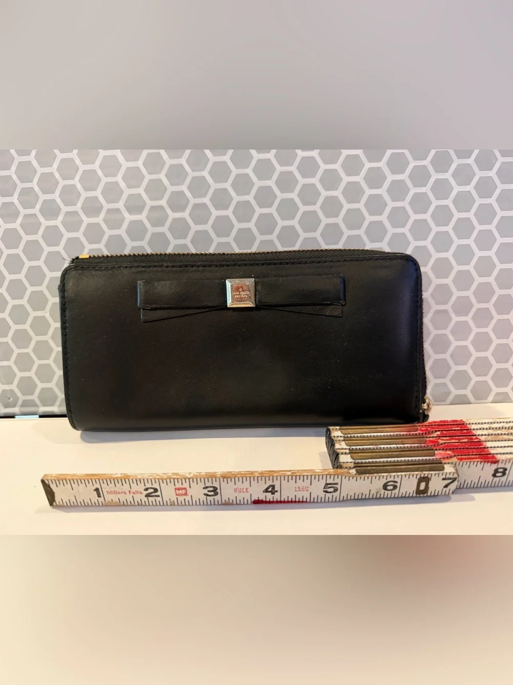Kate Spade Black Bow Zip-Around Wallet with Gold Logo Plaque